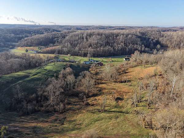 Rolling private farmland and hardwood timber in Meigs County, Ohio