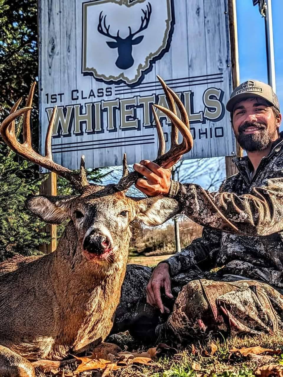 Hunter with a heavy-antlered late-season Ohio buck